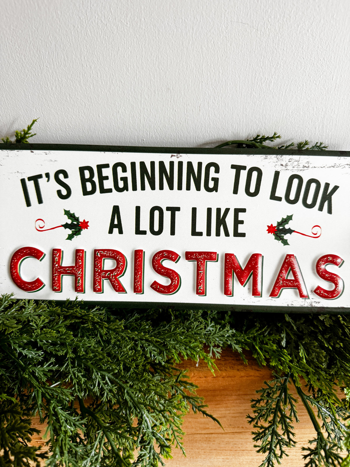 It’s beginning to look a lot like Christmas metal sign