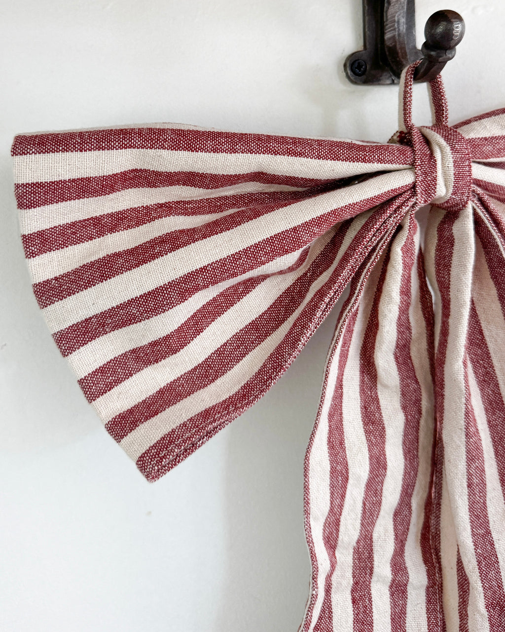 Large red stripe bow