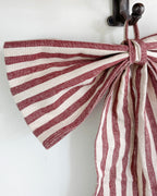 Large red stripe bow