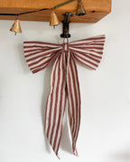 Large red stripe bow