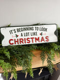 It’s beginning to look a lot like Christmas metal sign