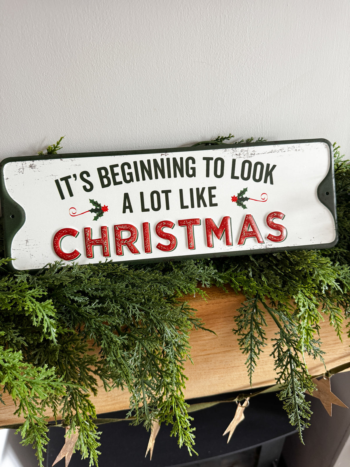 It’s beginning to look a lot like Christmas metal sign