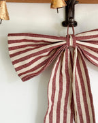 Large red stripe bow