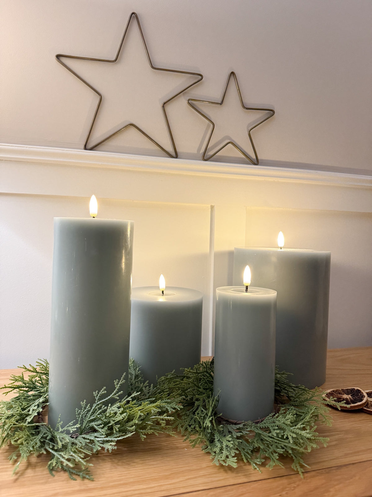 Sage green melt effect LED candle 3.5 x 9