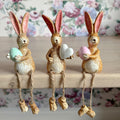 Shelf sitting bunnies with dangly legs