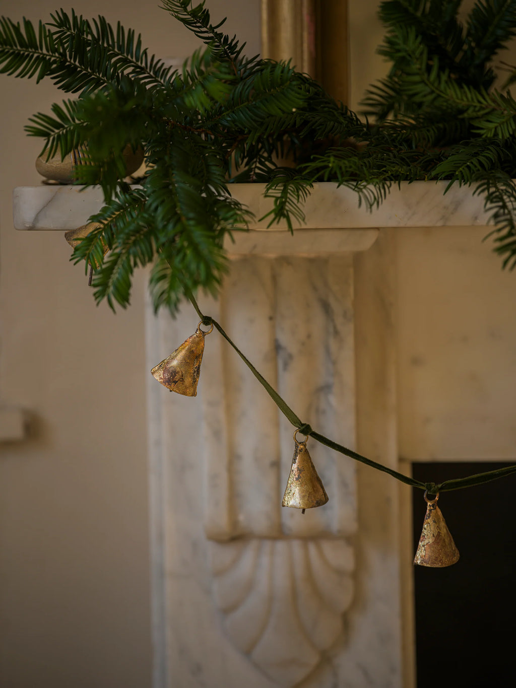 Brass bell garland on velvet ribbon