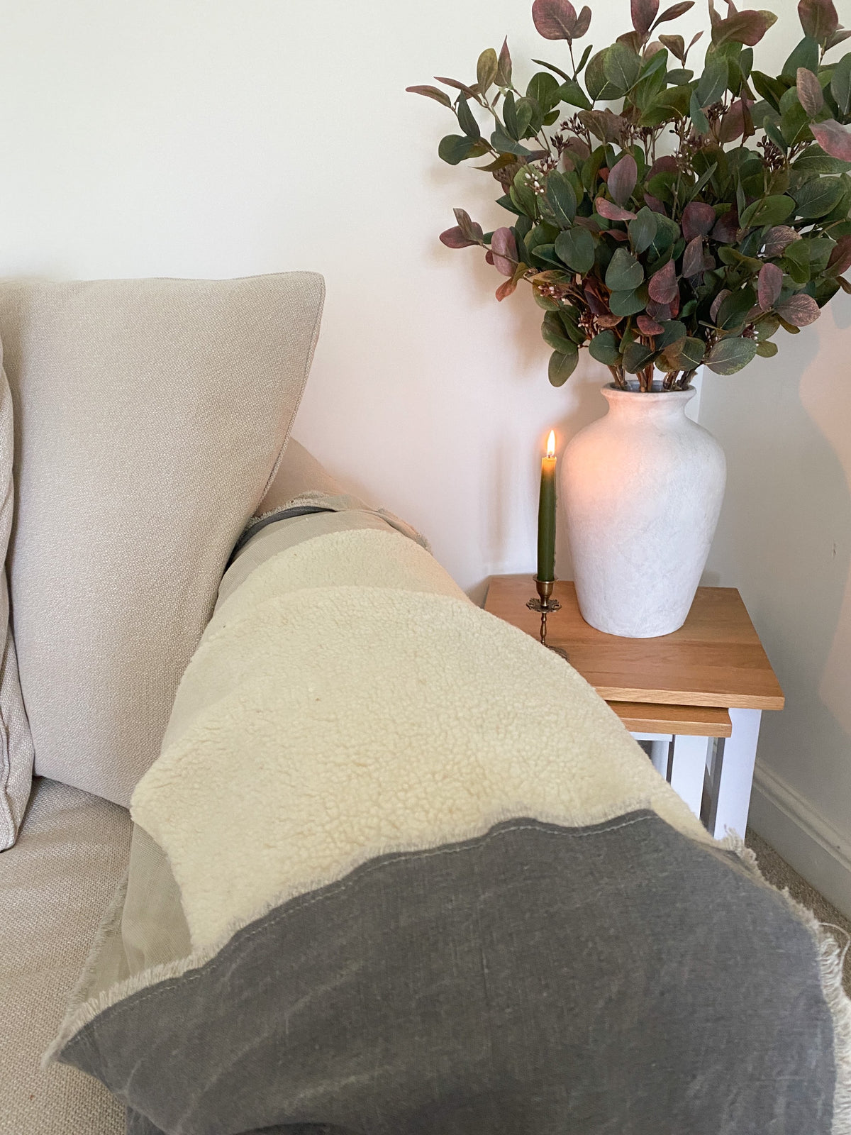 Grey throw with sheepskin