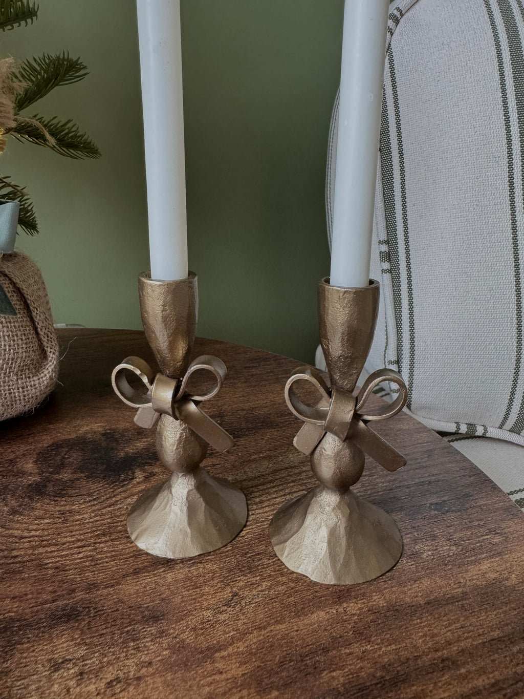 Antique brass bow candle holder