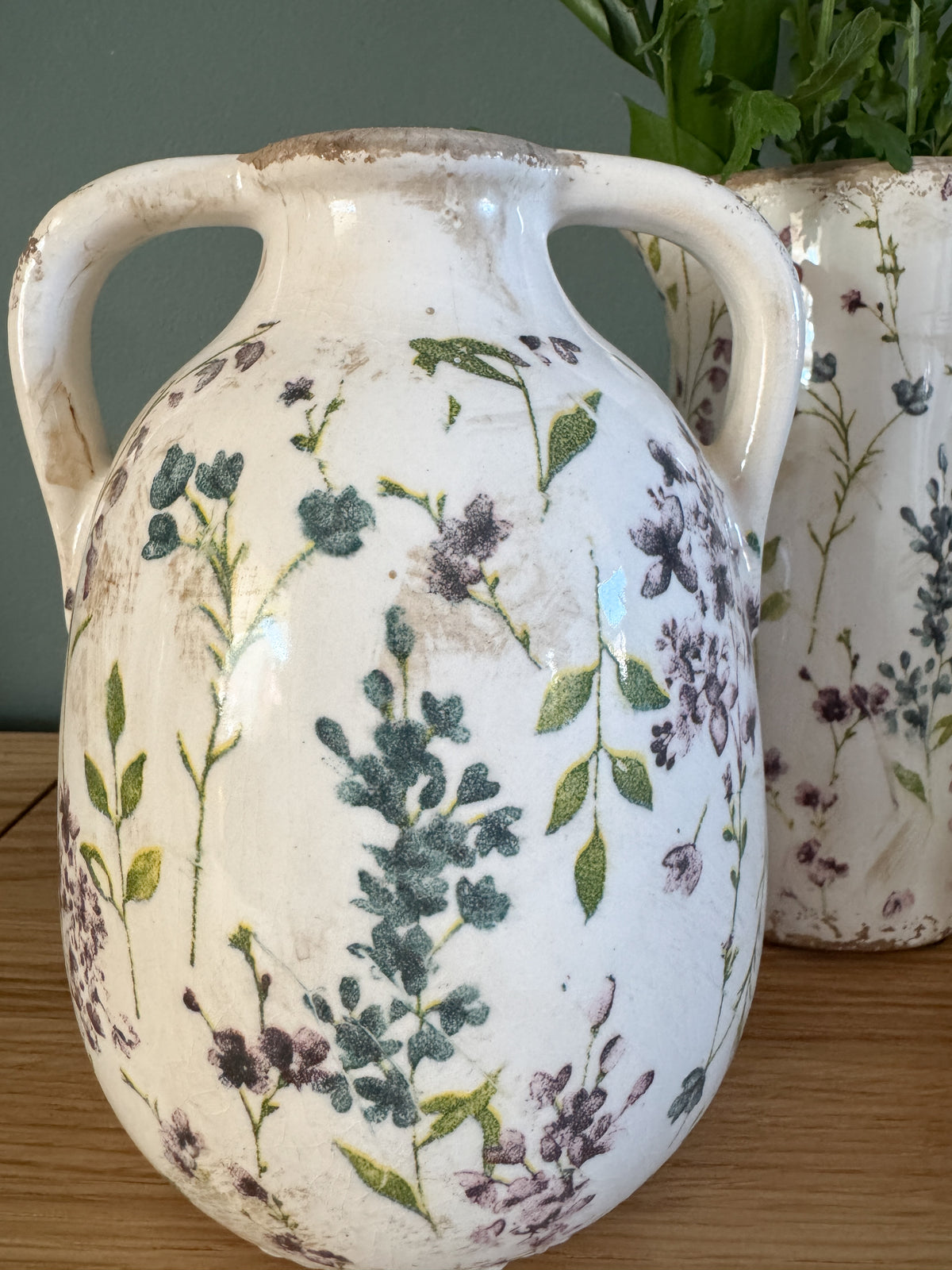 Distressed floral jug