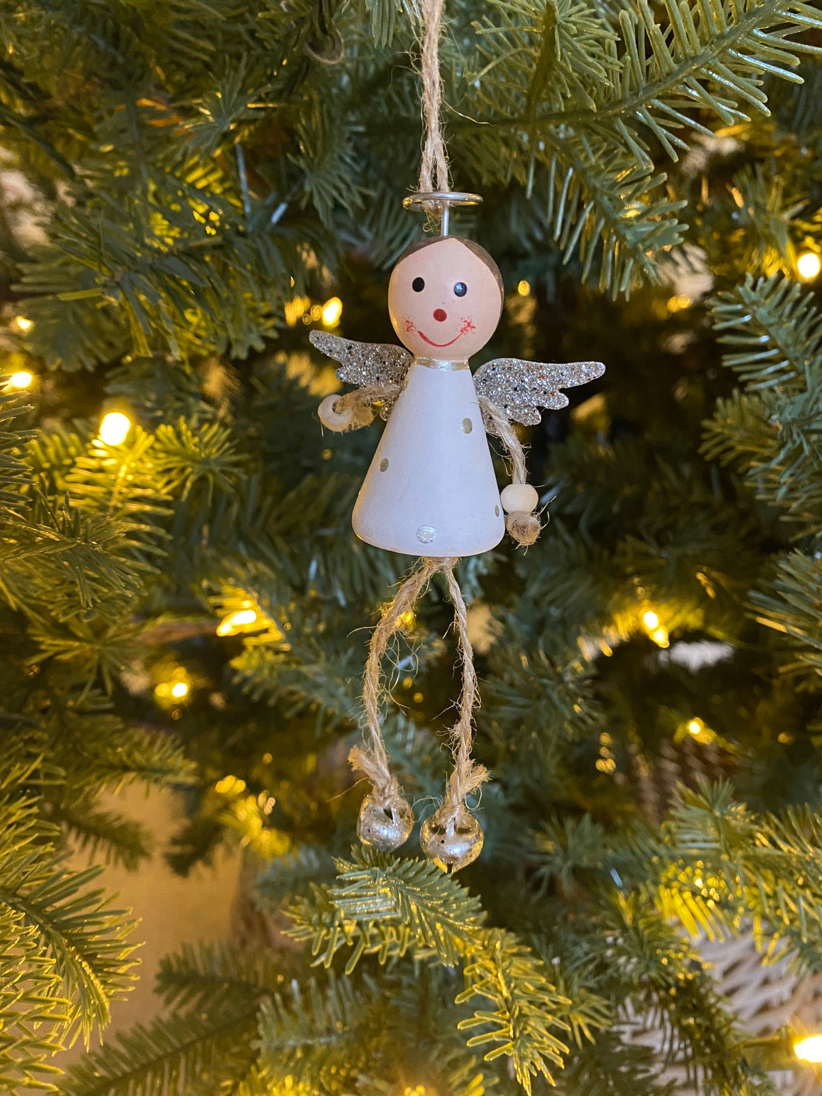 Wooden Angel with dangling legs