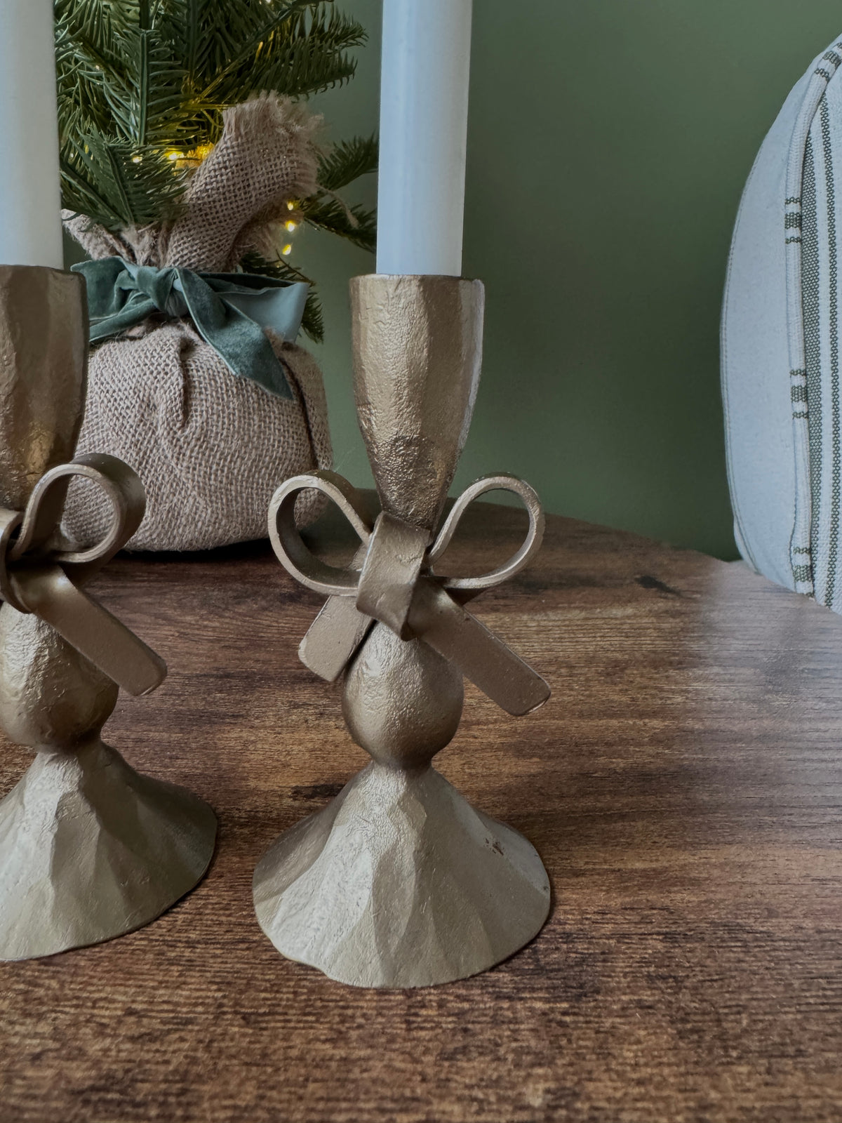Antique brass bow candle holder