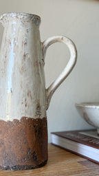 Aged terracotta jug