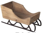 Neutral wooden sleigh