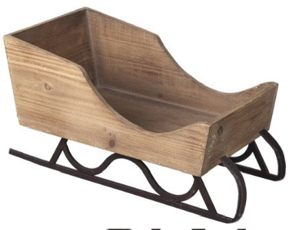 Neutral wooden sleigh