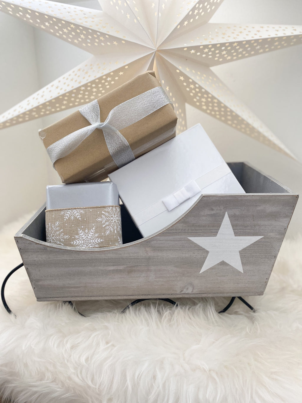 Grey wooden Santa sleigh with star