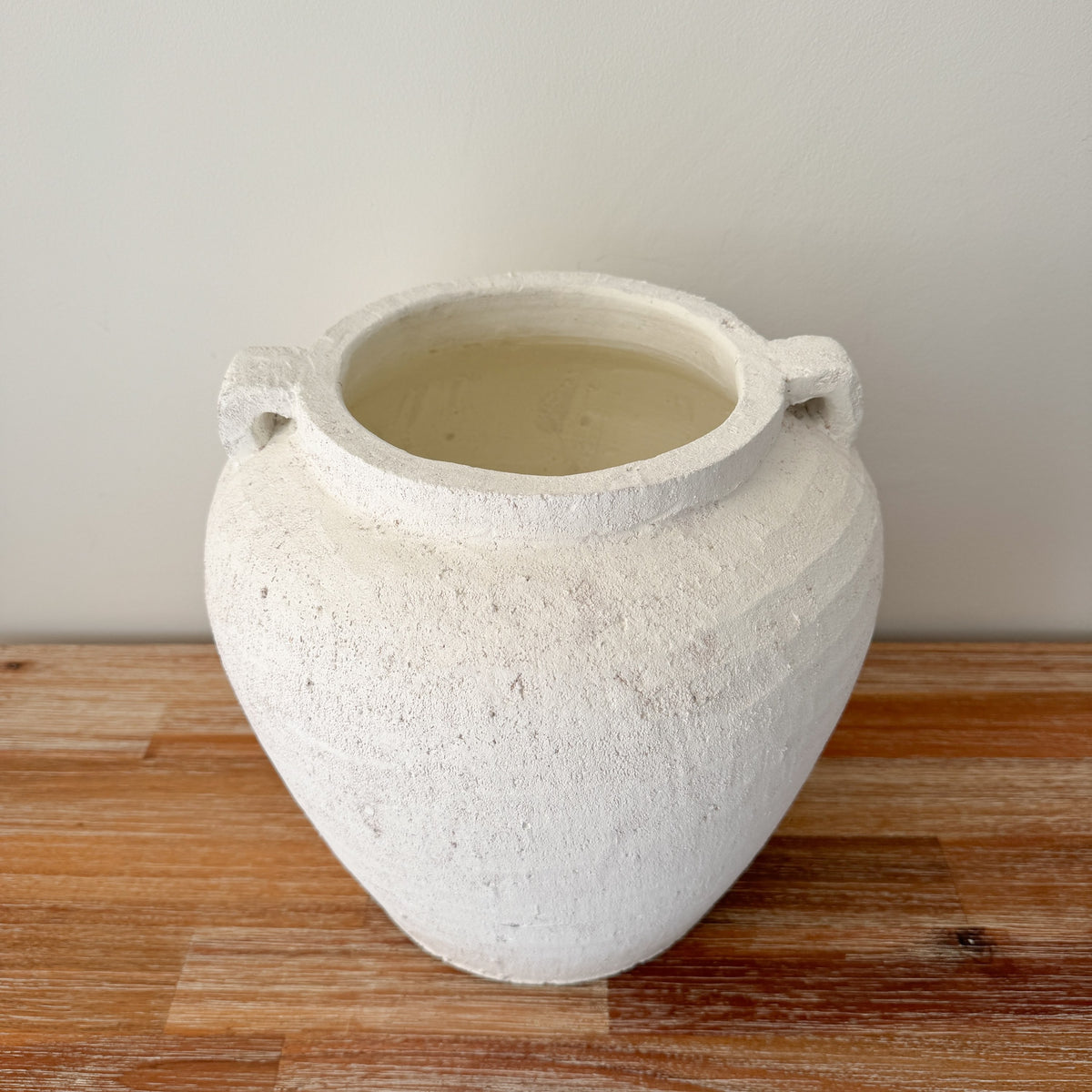 Large white terracotta vase with handles