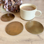 Set of 4 brass coasters