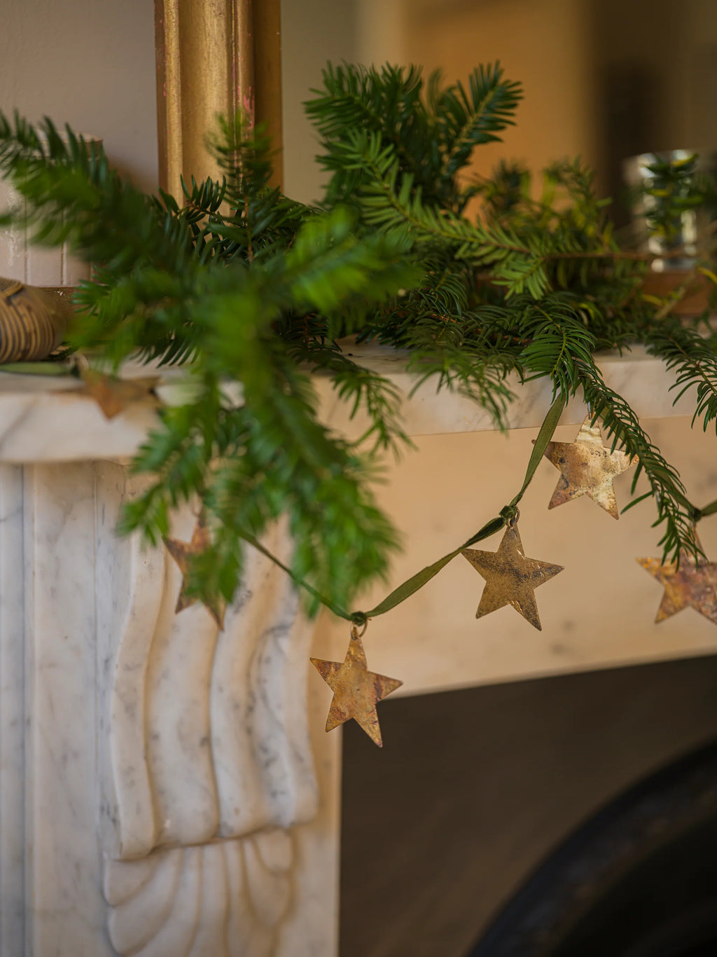 Brass star garland on velvet ribbon