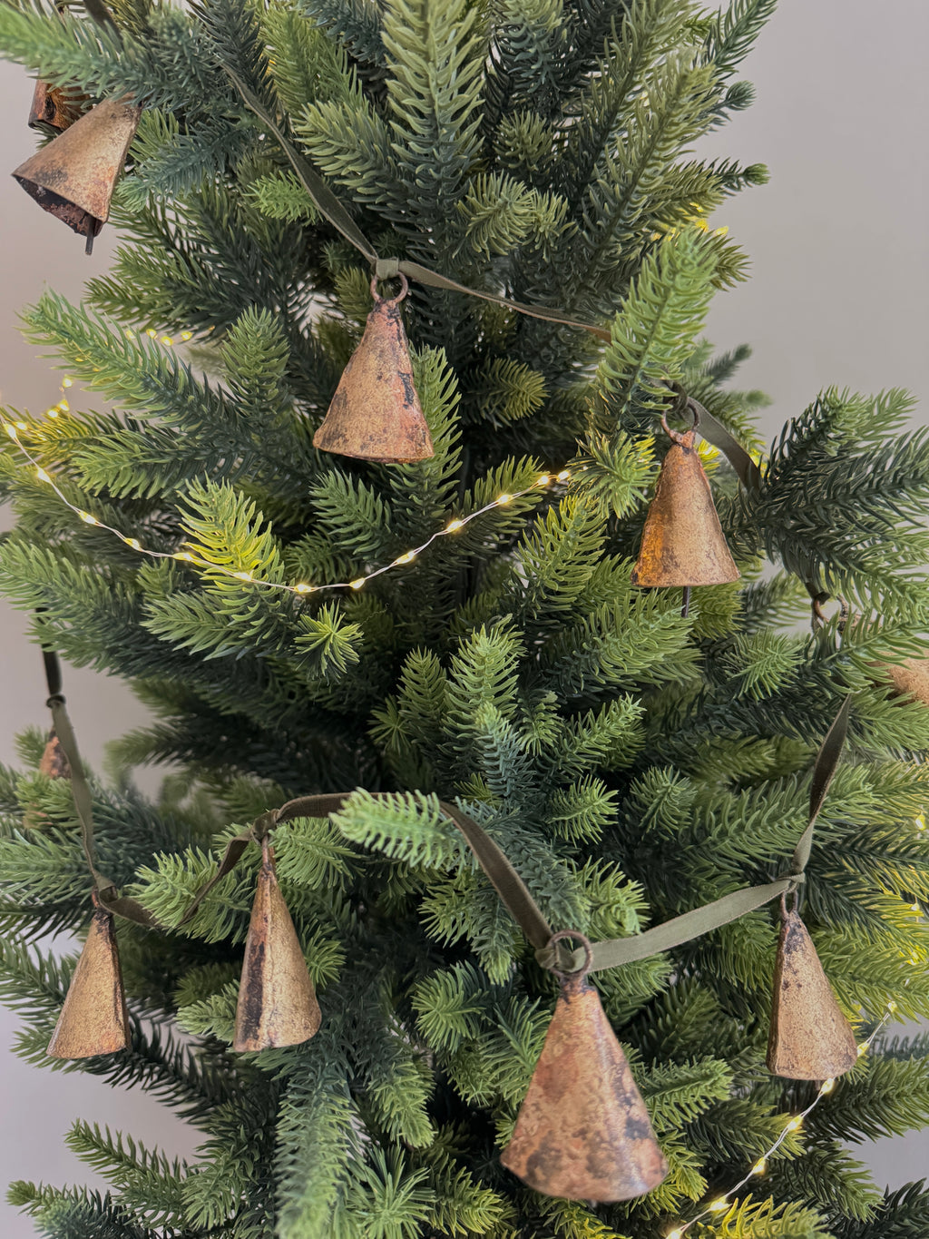 Brass bell garland on velvet ribbon