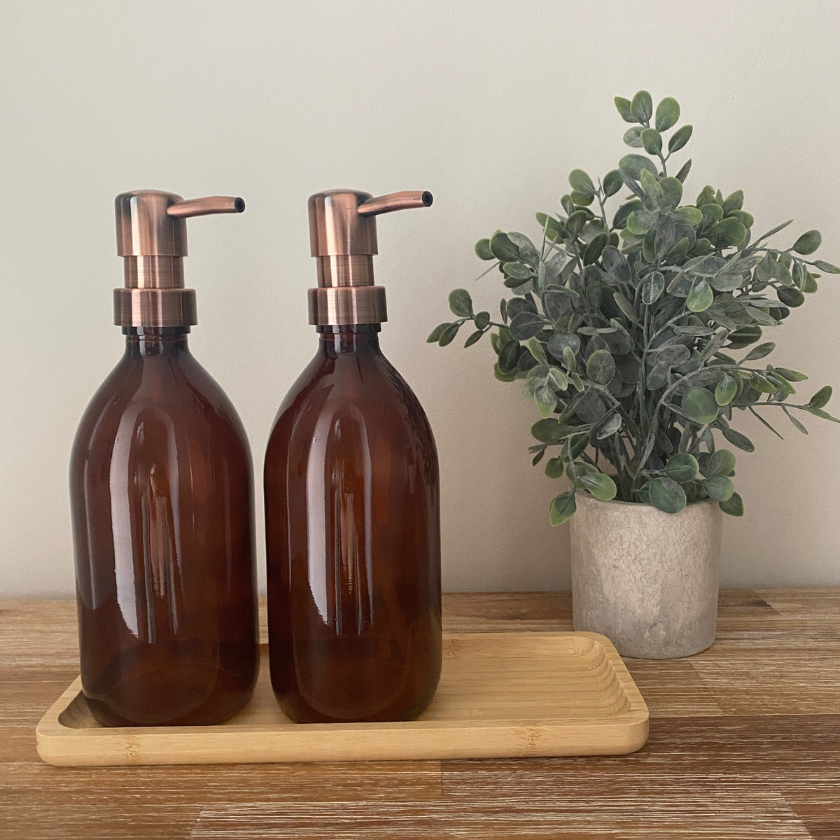 Amber refillable glass bottle