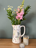 Distressed floral jug