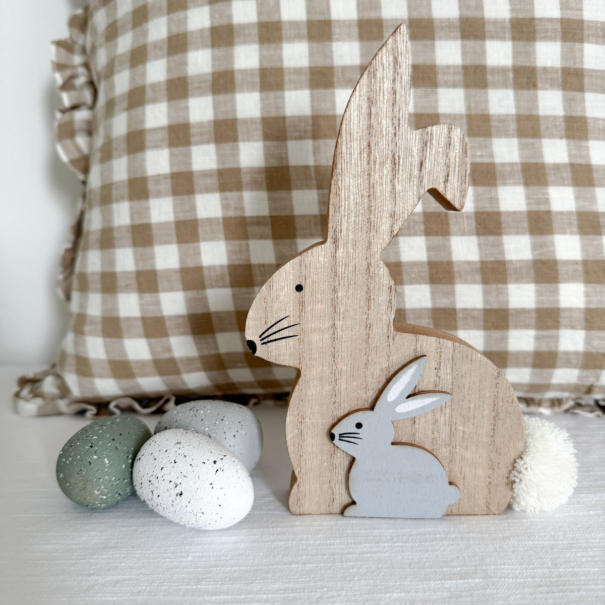 Rustic wooden rabbit with pompom tail