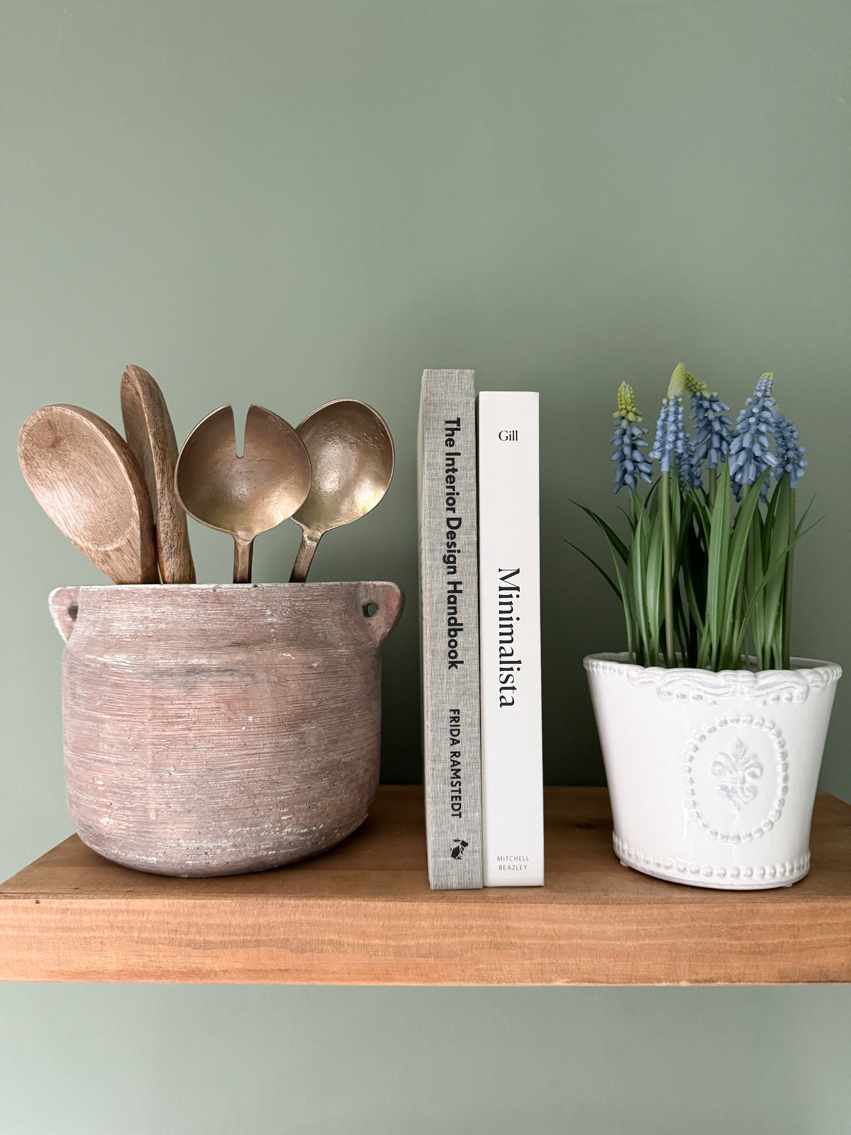 Faux grape hyacinth in stone pot