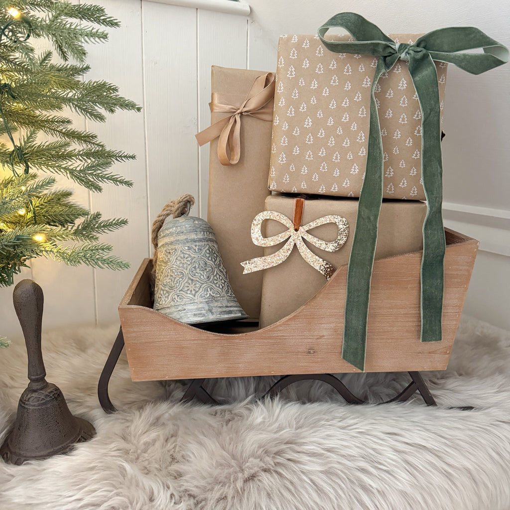 Neutral wooden sleigh